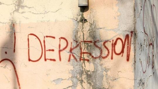 Ein Schriftzug «Depression» prangt an einer Hauswand