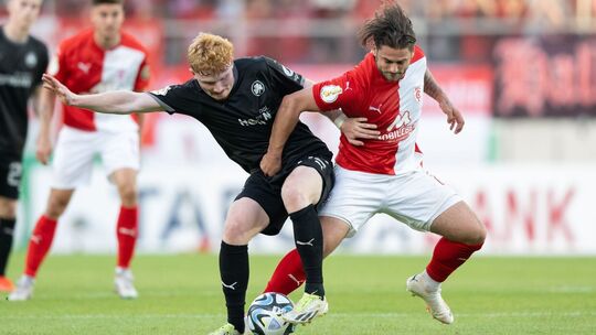 Dominic Baumann (r)