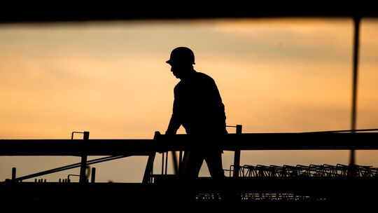 Bauarbeiter auf einer Baustelle Bauarbeiter auf einer Baustelle